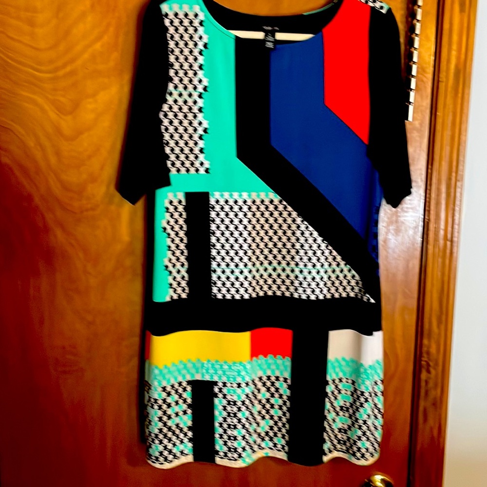 Abstract colored midi in size Large polyester with 5% spandex.